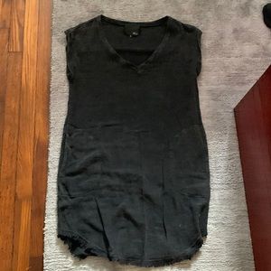 Beach coverup. Never worn. Slightly see through with pockets